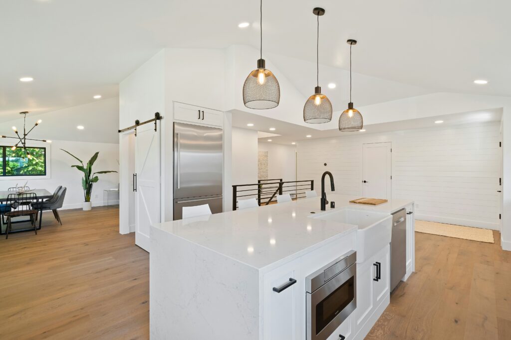 white kitchen, lighting, barn doors